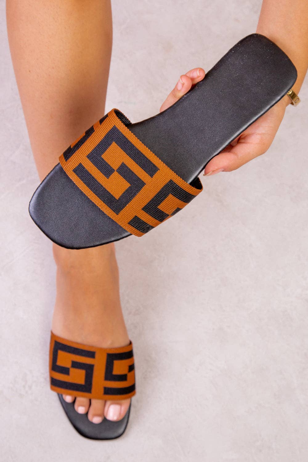 SUNKISS FLAT SLIDERS WITH MONOGRAM DETAIL STRAP IN BLACK